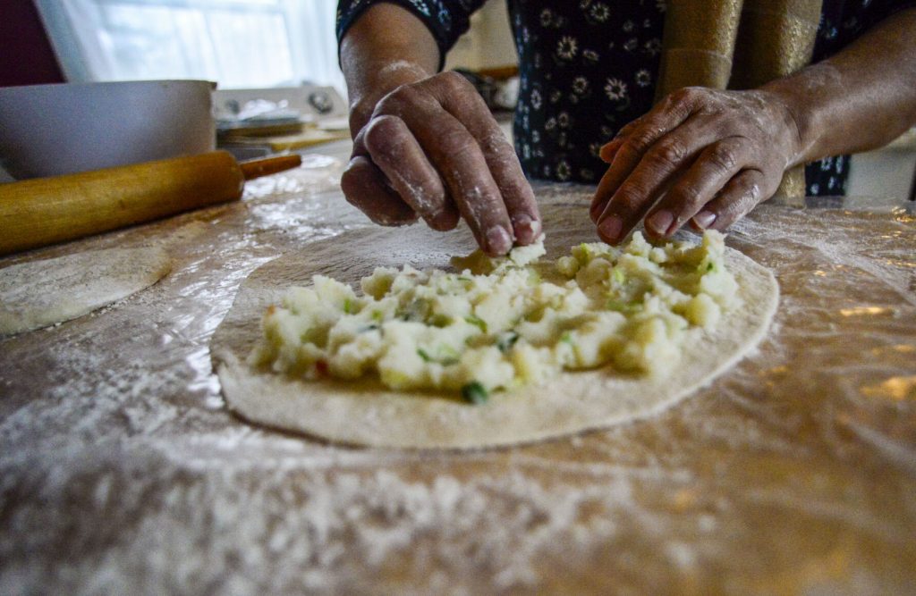 Afghanistan-refugees-vermont-baking-bread-brattleboro-food-coop-vermont country magazine