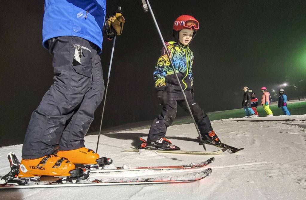 Mount Snow instructors help area children learn how to either ski or snowboard at the ski hill at Living Memorial Park in Brattleboro in January 2023-vermont country magazine-2