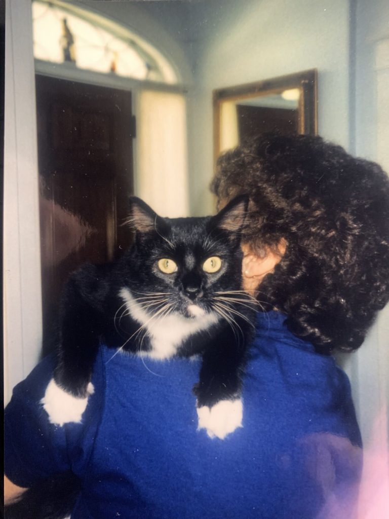 Chloe, the author's cat who preceded her "brothers" Milo and Rocco, is shown with the author's mother. When Rondeau's mother passed, Chloe became his cat. Mark Rondeau — Vermont Country