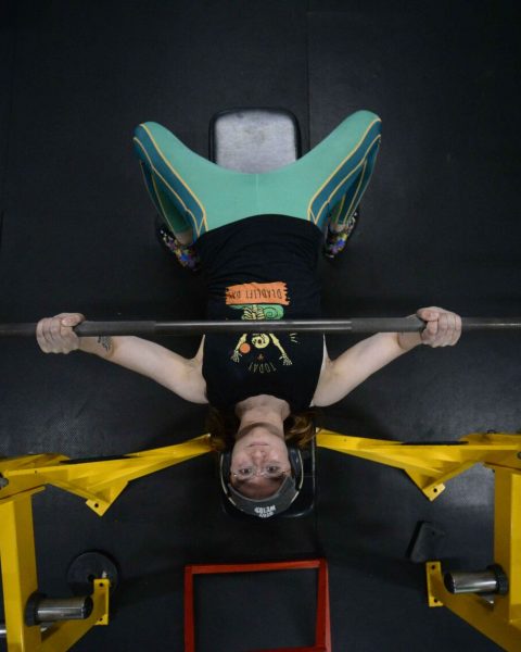 Tina Dalton bench presses during training at Supreme Fitness in May 2023. Kristopher Radder — Vermont Country Magazine.