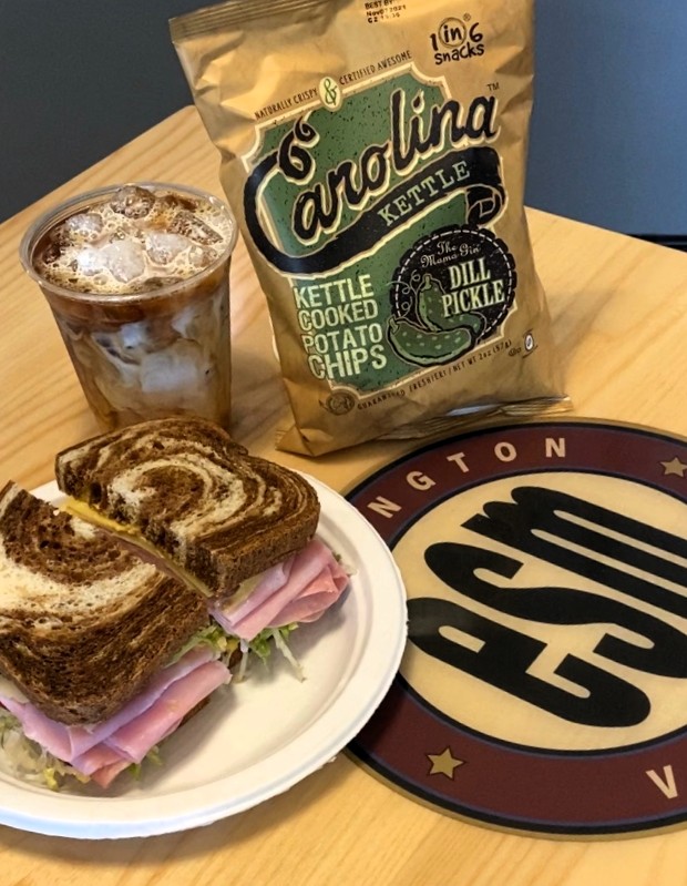 Our Reuben with an iced coffee and chips