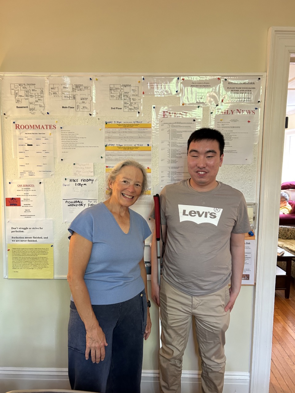 2. Van der Linde and Lu at the Bulletin Board Large